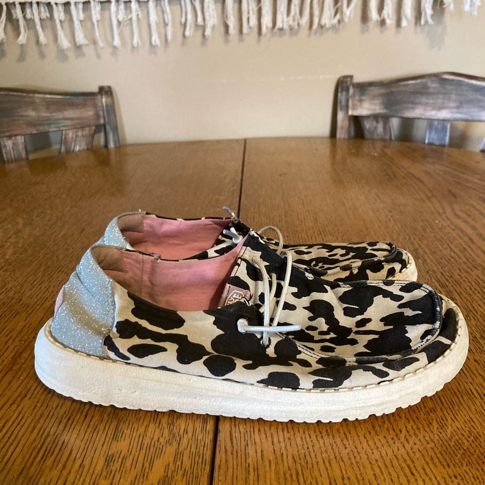Hey Dude Black and White Cow Print Shoes